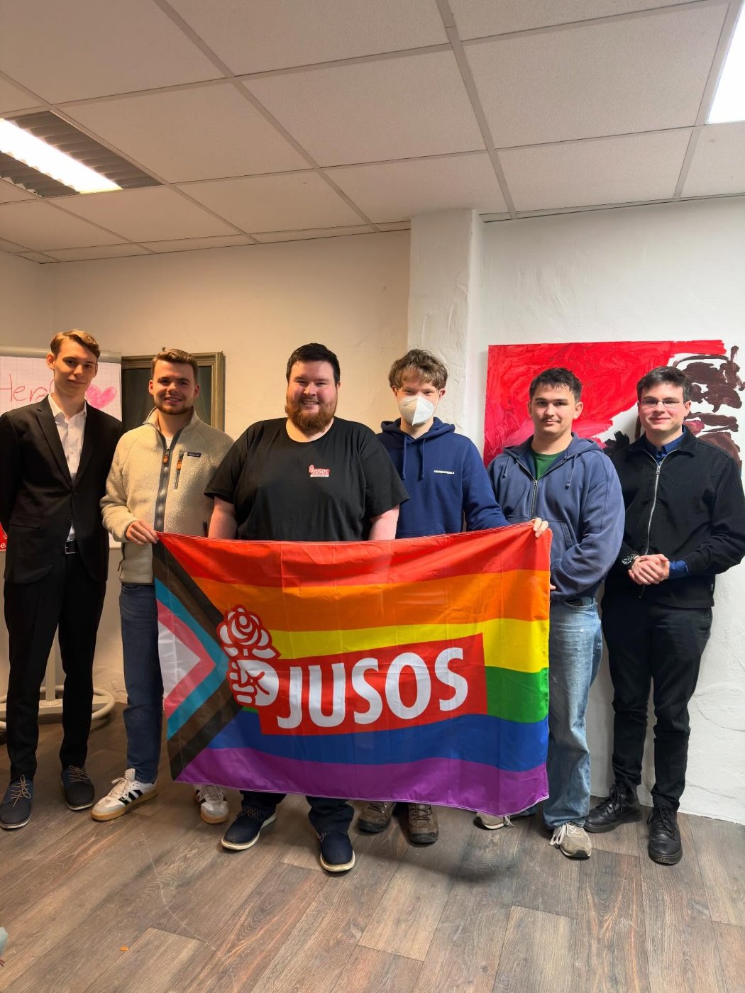 Meherere Personen, Juso Flagge 
